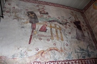 A Medieval painting of St. George slaying the dragon (symbolizing the vanquishing of pagans) as the princess stands by.