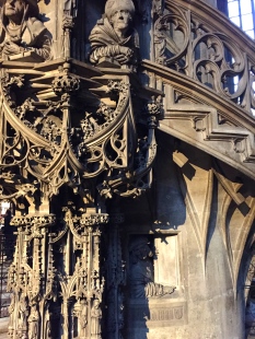 The stone pulpit sinuously entwines itself around a column. Depicted are four church fathers of the faith being gawked at by the sculptor himself. (You can barely see him craning his neck out of a window beneath the stairs. In German he's called the Fenstergucker -- "window gawker.")