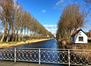 Rows of trees and quaint houses border the stick-straight Damme Canal (also known as the Napoleon Canal), built in 1811.