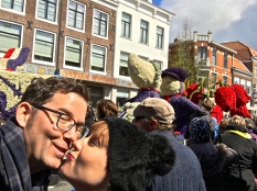 Matthew takes a peek while trying perfect our "Kissing Delft Dutch Couple" pose (note the float in the background.)