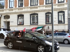 Taxis get in on the action by flying the Norwegian flag.