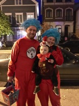 Dr. Seuss's Cat in the Hat, plus Thing 1 and Thing 2. Wins the award for best way to use a baby to get free candy.